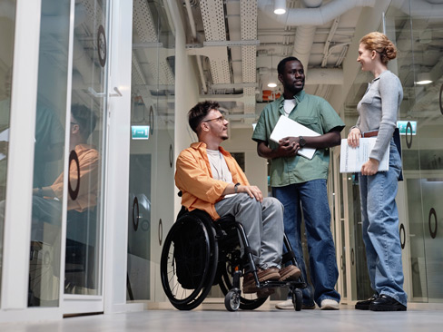 Business people talking in office hall
